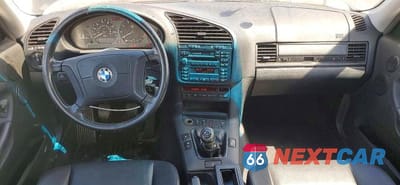 Zdjęcie 8 z 12 samochodu: 1998 BMW 323 IS VIN:WBABF7326WEH40760 - miniatura