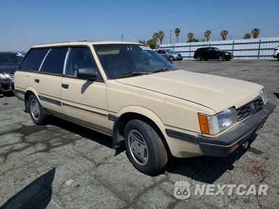 Czwarte zdjęcie samochodu z boku: 1988 SUBA OUTBACK VIN:JF2AN55B7GD411848 - miniatura
