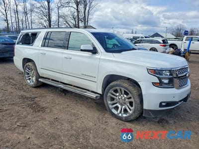 Czwarte zdjęcie samochodu z boku: 2017 CHEVROLET SUBURBAN K1500 LT VIN:1GNSKHKC6HR405612 - miniatura