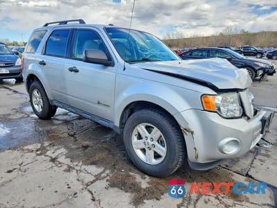 Czwarte zdjęcie samochodu z boku: 2012 FORD ESCAPE HYBRID VIN:1FMCU4K33CKA82133 - miniatura
