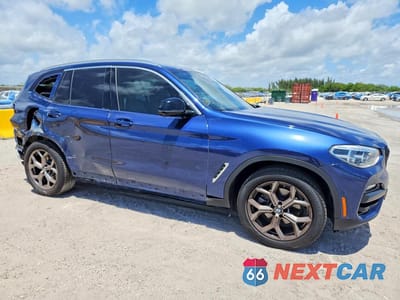 Czwarte zdjęcie samochodu z boku: 2021 BMW X3 XDRIVE30I VIN:5UXTY5C03M9H92484 - miniatura