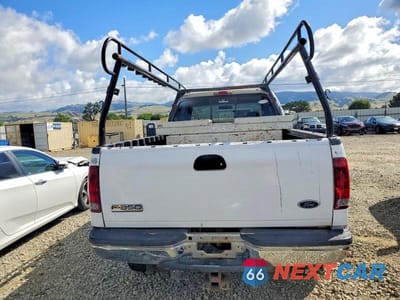Zdjęcie 10 z 13 samochodu: 2001 FORD F250 SUPER DUTY VIN:1FTNX21F21EA55389 - miniatura