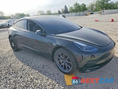 Czwarte zdjęcie samochodu z boku: 2023 TESLA MODEL 3 VIN:5YJ3E1EAXPF625281 - miniatura