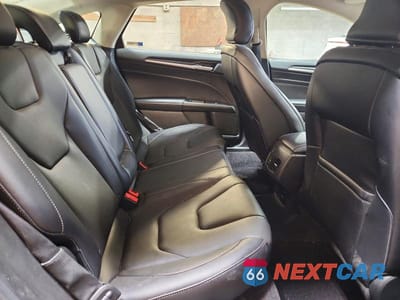 Zdjęcie 10 z 12 samochodu: 2017 FORD FUSION TITANIUM VIN:3FA6P0D97HR184093 - miniatura