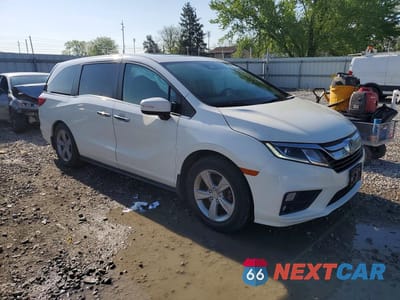 Czwarte zdjęcie samochodu z boku: 2018 HONDA ODYSSEY EXL VIN:5FNRL6H76JB025328 - miniatura