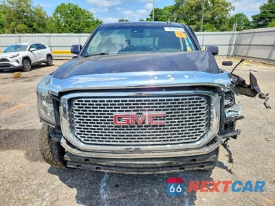 Piąte zdjęcie samochodu w środku: 2016 GMC YUKON DENALI VIN:1GKS1CKJ9GR368264 - miniatura