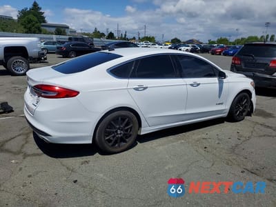 Trzecie zdjęcie samochodu z tyłu: 2017 FORD FUSION SE HYBRID VIN:3FA6P0LU8HR165395 - miniatura