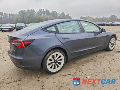 Trzecie zdjęcie samochodu z tyłu: 2021 TESLA MODEL 3 VIN:5YJ3E1EB7MF990229 - miniatura