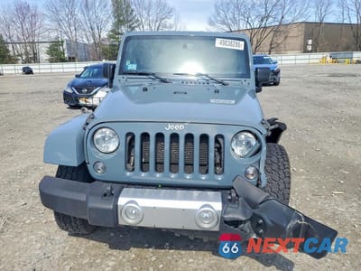 Piąte zdjęcie samochodu w środku: 2015 JEEP WRANGLER SAHARA VIN:1C4AJWBG2FL620497 - miniatura