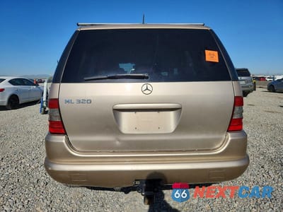 Zdjęcie 6 z 13 samochodu: 2001 MERCEDES-BENZ ML 320 VIN:4JGAB54E51A247152 - miniatura