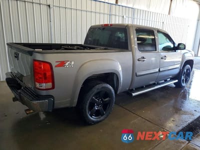 Trzecie zdjęcie samochodu z tyłu: 2012 GMC SIERRA K1500 SLT VIN:3GTP2WE76CG242227 - miniatura