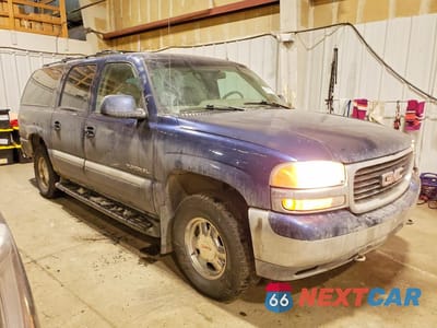 Czwarte zdjęcie samochodu z boku: 2002 GMC YUKON XL K1500 VIN:3GKFK16Z02G284376 - miniatura