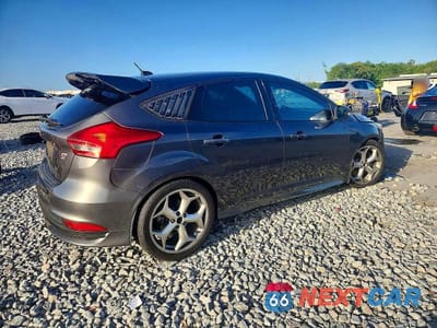 Trzecie zdjęcie samochodu z tyłu: 2016 FORD FOCUS ST VIN:1FADP3L94GL318291 - miniatura
