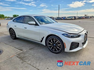 Czwarte zdjęcie samochodu z boku: 2022 BMW I4 EDRIVE 40 VIN:WBY73AW01NFN10198 - miniatura