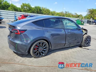 Trzecie zdjęcie samochodu z tyłu: 2022 TESLA MODEL Y VIN:7SAYGDEF8NF379635 - miniatura