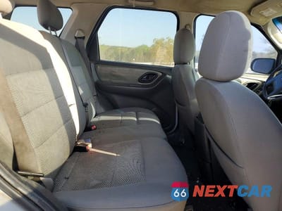 Zdjęcie 11 z 13 samochodu: 2005 FORD ESCAPE XLT VIN:1FMYU03115KB35264 - miniatura
