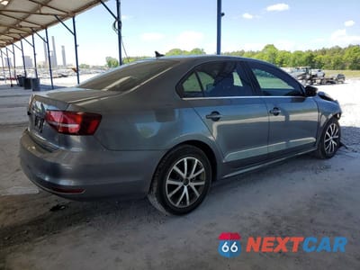 Trzecie zdjęcie samochodu z tyłu: 2017 VOLKSWAGEN JETTA SE VIN:3VWDB7AJ0HM391992 - miniatura