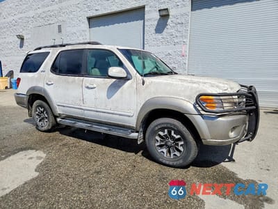 Czwarte zdjęcie samochodu z boku: 2003 TOYOTA SEQUOIA SR5 VIN:5TDZT34A83S155884 - miniatura