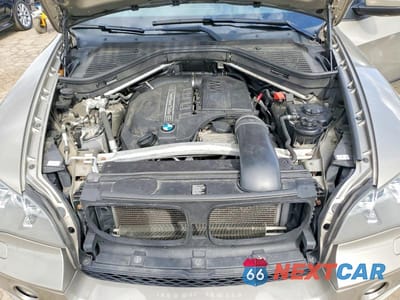 Zdjęcie 12 z 13 samochodu: 2012 BMW X5 XDRIVE35I VIN:5UXZV4C50CL890105 - miniatura