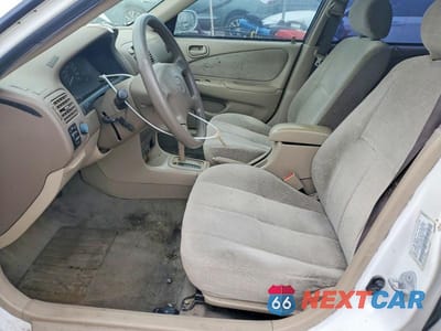 Zdjęcie 7 z 11 samochodu: 2002 TOYOTA COROLLA LE VIN:1NXBR12E12Z593632 - miniatura