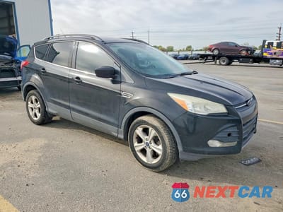 Czwarte zdjęcie samochodu z boku: 2014 FORD ESCAPE SE VIN:1FMCU0G90EUA84709 - miniatura