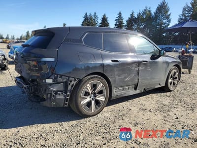 Trzecie zdjęcie samochodu z tyłu: 2022 BMW IX XDRIVE50 VIN:WB523CF03NCK69247 - miniatura