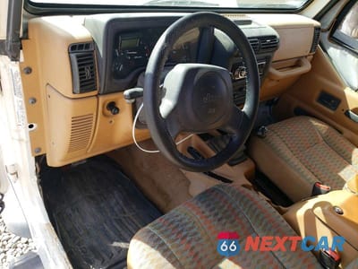 Zdjęcie 8 z 12 samochodu: 1997 JEEP WRANGLER / TJ SE VIN:1J4FY29P3VP418690 - miniatura