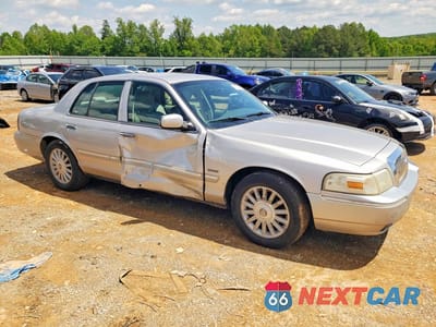 Czwarte zdjęcie samochodu z boku: 2010 MERCURY GRAND MARQUIS LS VIN:2MEBM7FV3AX615278 - miniatura