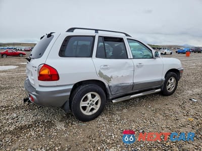 Trzecie zdjęcie samochodu z tyłu: 2002 HYUNDAI SANTA FE GLS VIN:KM8SC13D82U287535 - miniatura