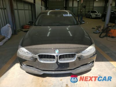Piąte zdjęcie samochodu w środku: 2014 BMW 320 I VIN:WBA3B1G51ENT00829 - miniatura