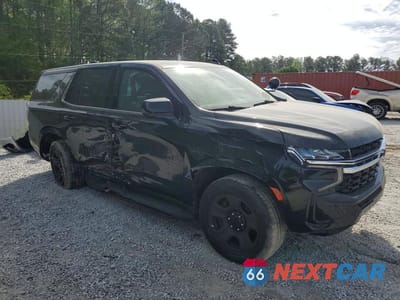 Czwarte zdjęcie samochodu z boku: 2023 CHEVROLET TAHOE C1500 VIN:1GNSCLED6PR259733 - miniatura