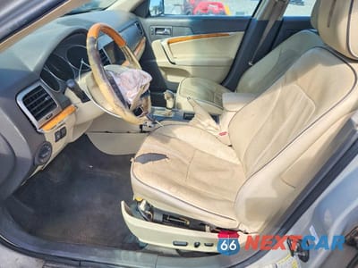 Zdjęcie 7 z 13 samochodu: 2010 LINCOLN MKZ VIN:3LNHL2GC9AR643482 - miniatura