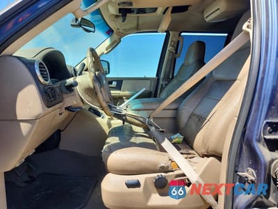 Zdjęcie 7 z 13 samochodu: 2004 FORD EXPEDITION XLT VIN:1FMPU16L74LA41493 - miniatura