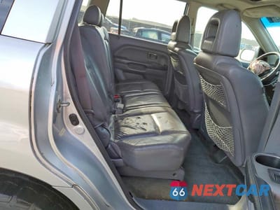Zdjęcie 10 z 12 samochodu: 2005 HONDA PILOT EXL VIN:5FNYF18665B006894 - miniatura