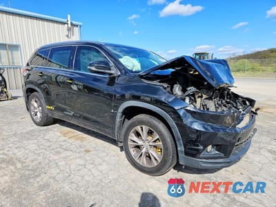 Czwarte zdjęcie samochodu z boku: 2014 TOYOTA HIGHLANDER XLE VIN:5TDJKRFH6ES024713 - miniatura