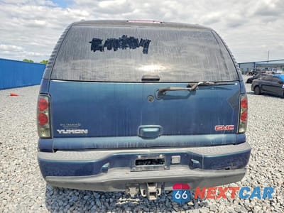 Zdjęcie 6 z 13 samochodu: 2005 GMC YUKON DENALI VIN:1GKEK63U05J243234 - miniatura