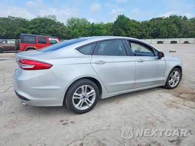 Trzecie zdjęcie samochodu z tyłu: 2018 FORD FUSION SE VIN:3FA6P0H73JR181304 - miniatura