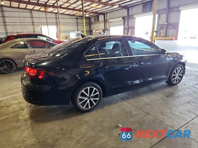 Trzecie zdjęcie samochodu z tyłu: 2018 VOLKSWAGEN JETTA SE VIN:3VWDB7AJXJM206160 - miniatura