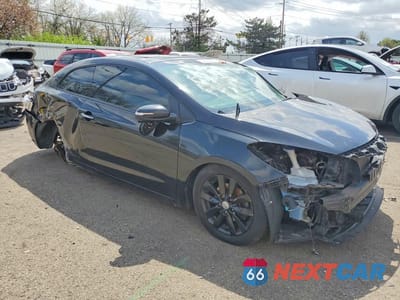 Czwarte zdjęcie samochodu z boku: 2016 KIA FORTE KOUP EX VIN:KNAFX6A88G5579309 - miniatura