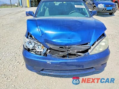 Zdjęcie 11 z 11 samochodu: 2006 TOYOTA CAMRY LE VIN:4T1BE30K96U106117 - miniatura