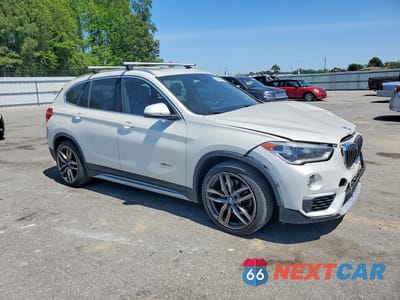 Czwarte zdjęcie samochodu z boku: 2016 BMW X1 XDRIVE28I VIN:WBXHT3C35GP880604 - miniatura