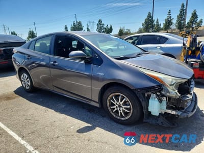 Czwarte zdjęcie samochodu z boku: 2018 TOYOTA PRIUS TWO VIN:JTDKBRFUXJ3585851 - miniatura