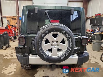 Zdjęcie 6 z 13 samochodu: 2011 JEEP WRANGLER UNLIMITED SAHARA VIN:1J4BA5H16BL620752 - miniatura