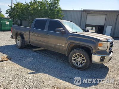Czwarte zdjęcie samochodu z boku: 2015 GMC SIERRA K1500 SLE VIN:3GTU2UEC2FG311004 - miniatura