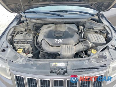 Zdjęcie 12 z 12 samochodu: 2014 JEEP GRAND CHEROKEE LAREDO VIN:1C4RJFAG4EC210464 - miniatura