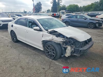 Czwarte zdjęcie samochodu z boku: 2013 VOLKSWAGEN PASSAT SE VIN:1VWBP7A30DC140668 - miniatura