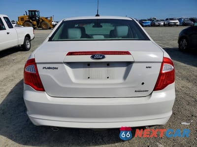 Zdjęcie 6 z 12 samochodu: 2011 FORD FUSION SE VIN:3FAHP0HG8BR322376 - miniatura