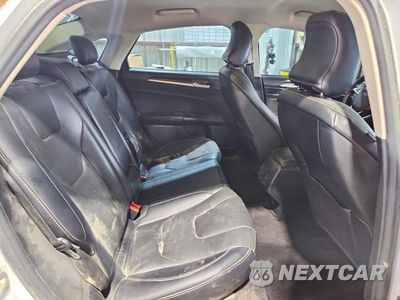 Zdjęcie 10 z 12 samochodu: 2017 FORD FUSION TITANIUM VIN:3FA6P0K98HR118087 - miniatura