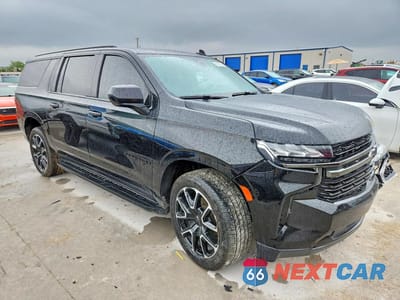 Czwarte zdjęcie samochodu z boku: 2021 CHEVROLET SUBURBAN C1500 RST VIN:1GNSCEKD4MR190813 - miniatura