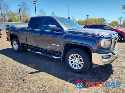 Czwarte zdjęcie samochodu z boku: 2016 GMC SIERRA K1500 SLE VIN:1GTV2MEC1GZ107168 - miniatura